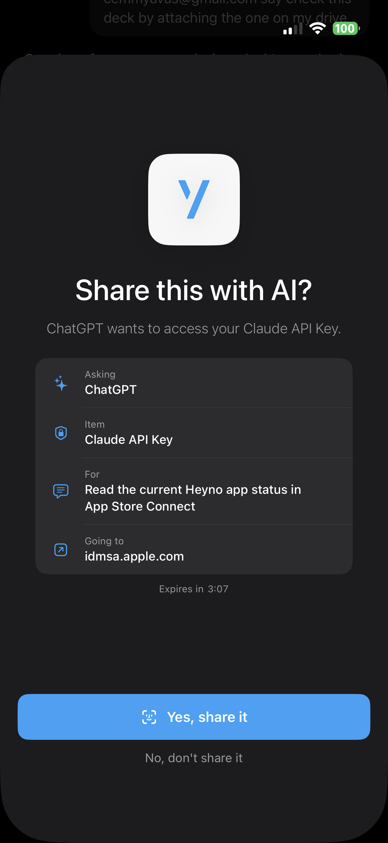 A share approval on iPhone: ChatGPT asking to access your Claude API key, granted with Face ID, dark mode